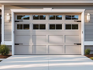 Modern Garage Door Replacement for Forest Hills, NY Homes Newly installed garage door on a Forest Hills, NY home, showcasing expert replacement and a blend of modern and traditional design.